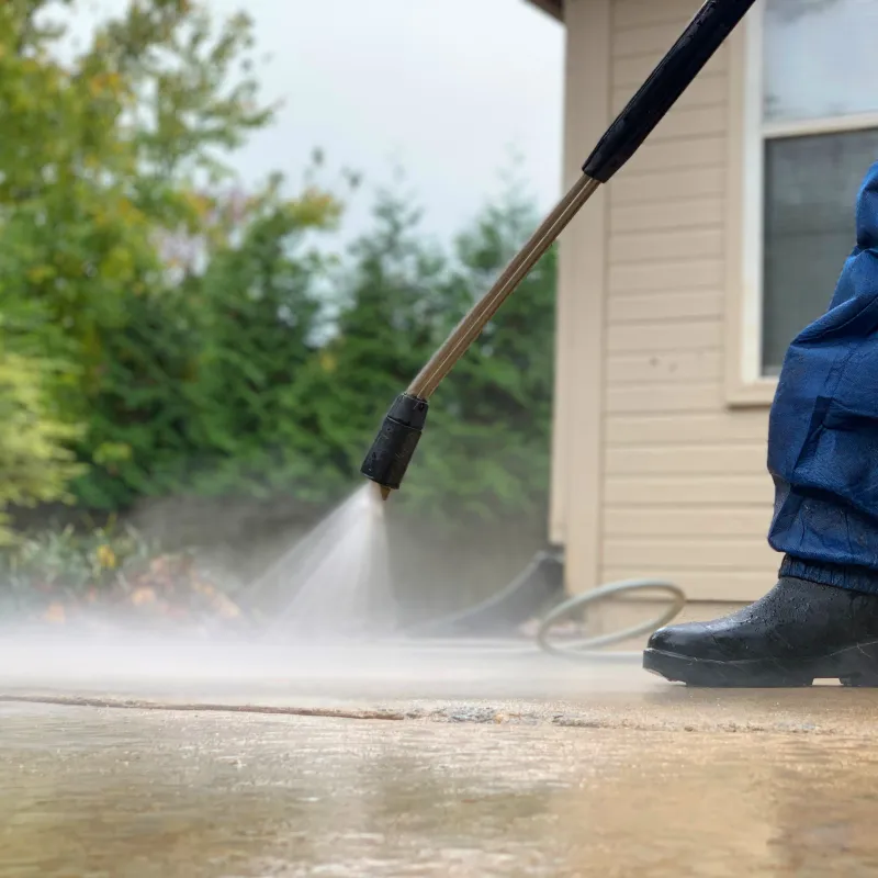 a person holding a hose