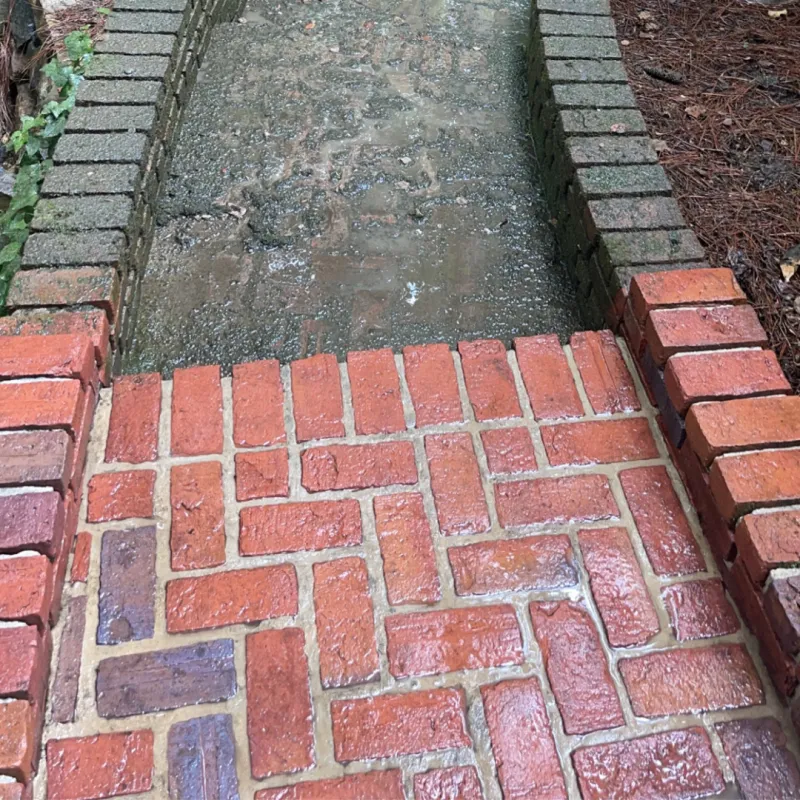 a brick walkway with a brick walkway