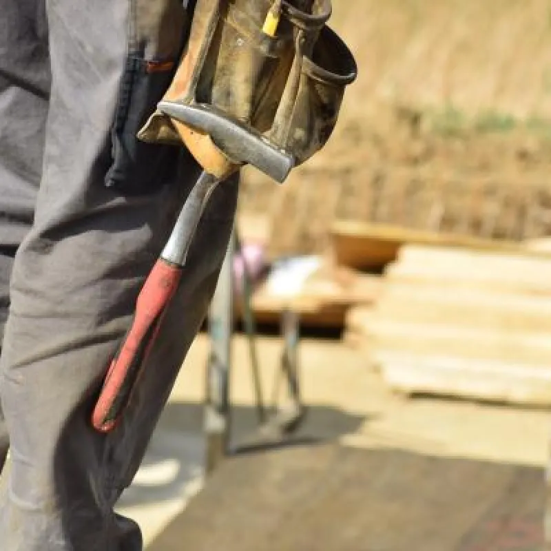 a person holding a tool