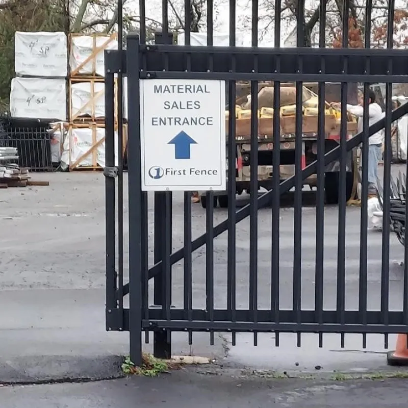 a gate with a sign on it