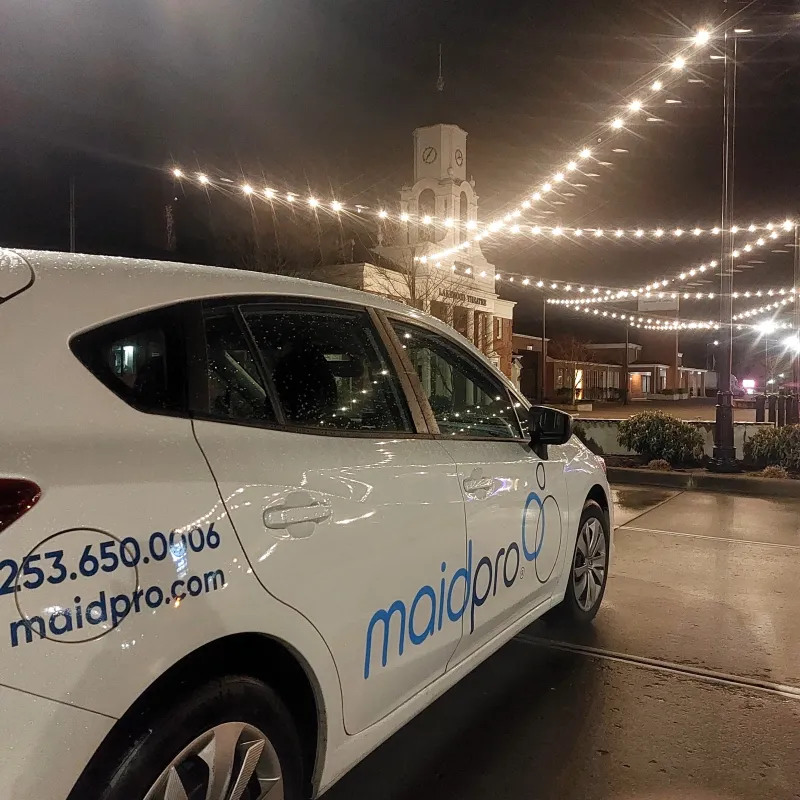 MaidPro Tacoma branded car outside at night in Tacoma, Washington