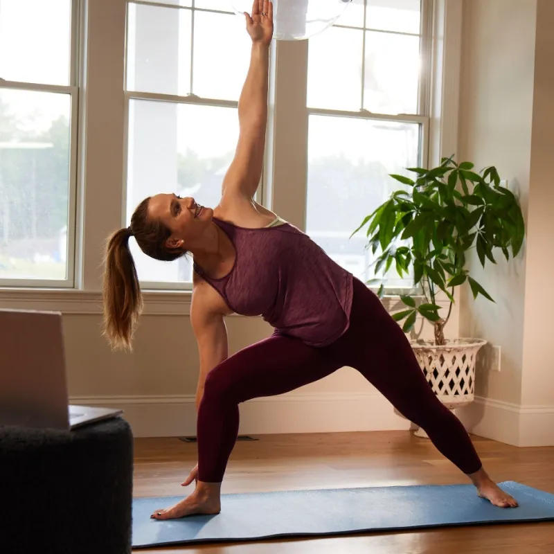 a person doing yoga in a room