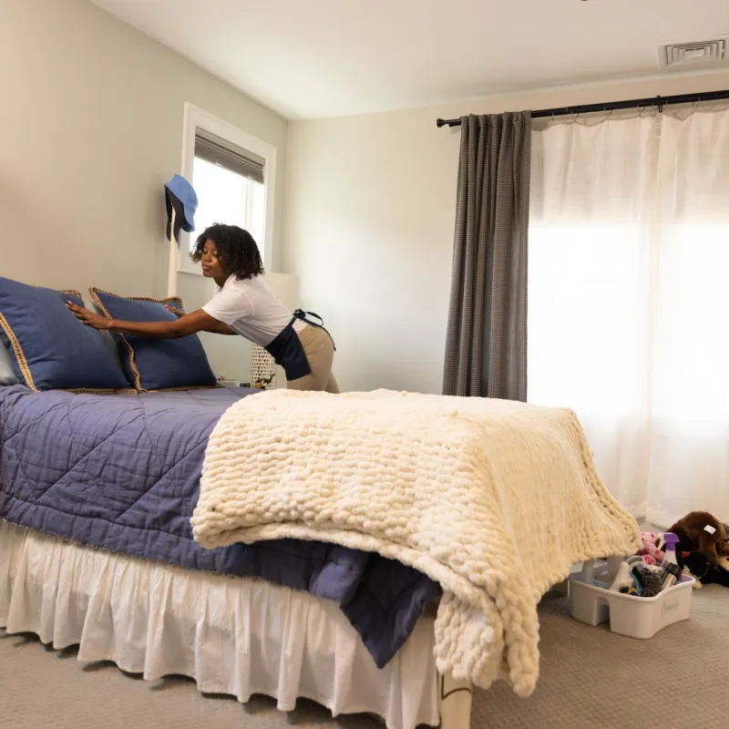 a person sitting on a bed