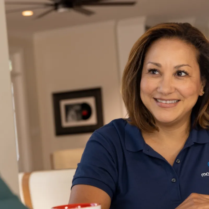 a woman smiling at the camera