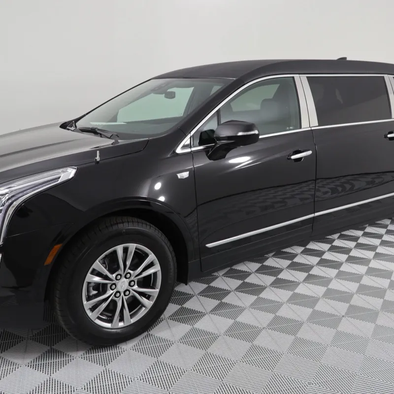 Sleek black Cadillac XT5 limousine showcasing modern design and luxury features.