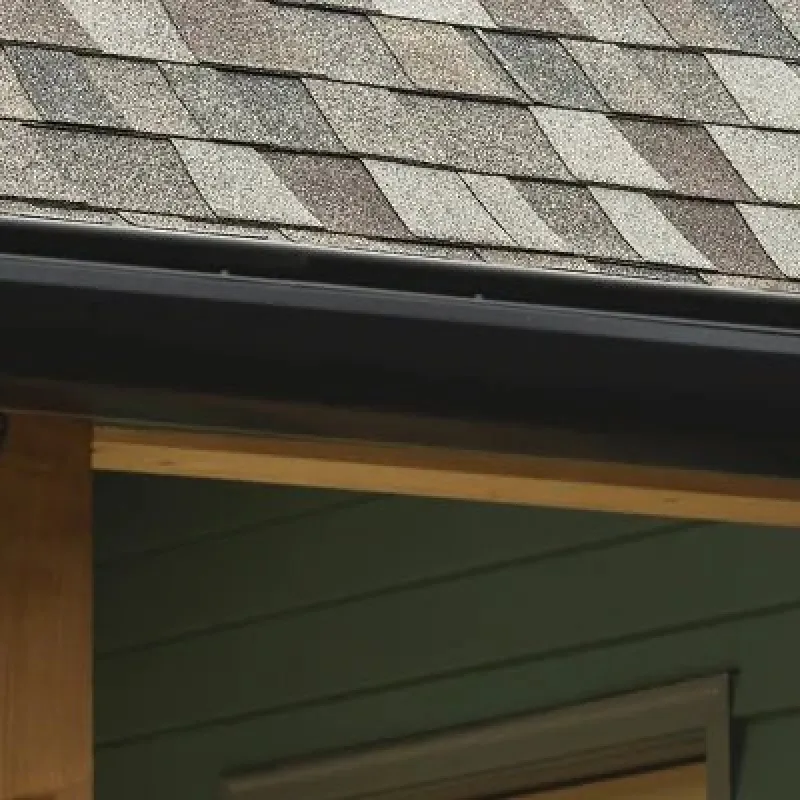 Close-up of new asphalt shingle roofing for instant roof quote by Nelson Exteriors in GA