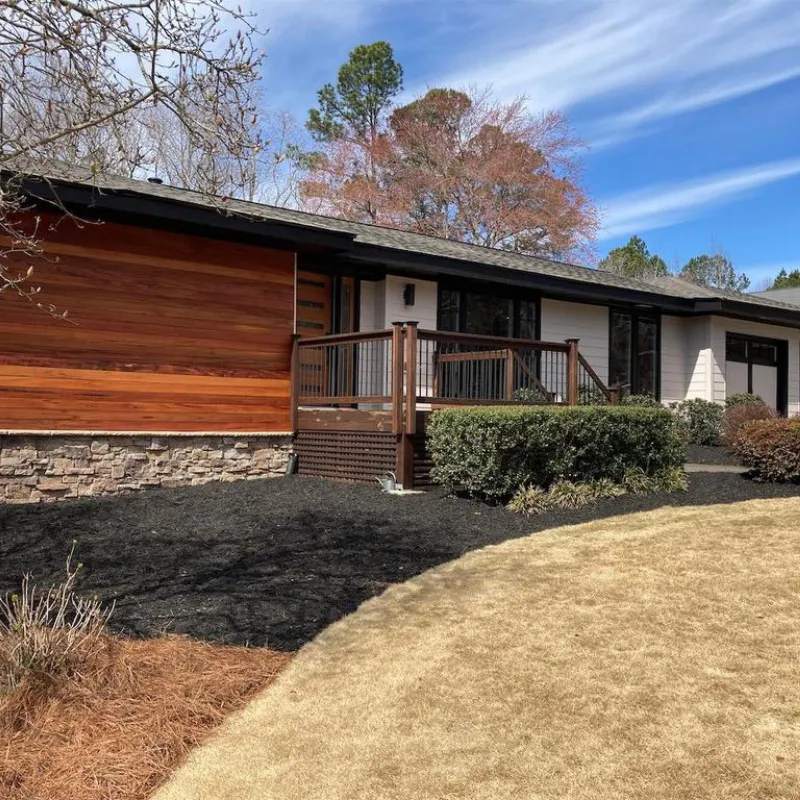 Brazilian hardwood siding installation on a modern home exterior by Nelson Exteriors