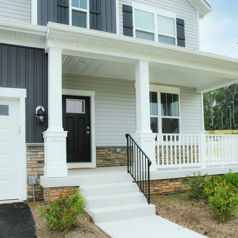 a white house with a porch