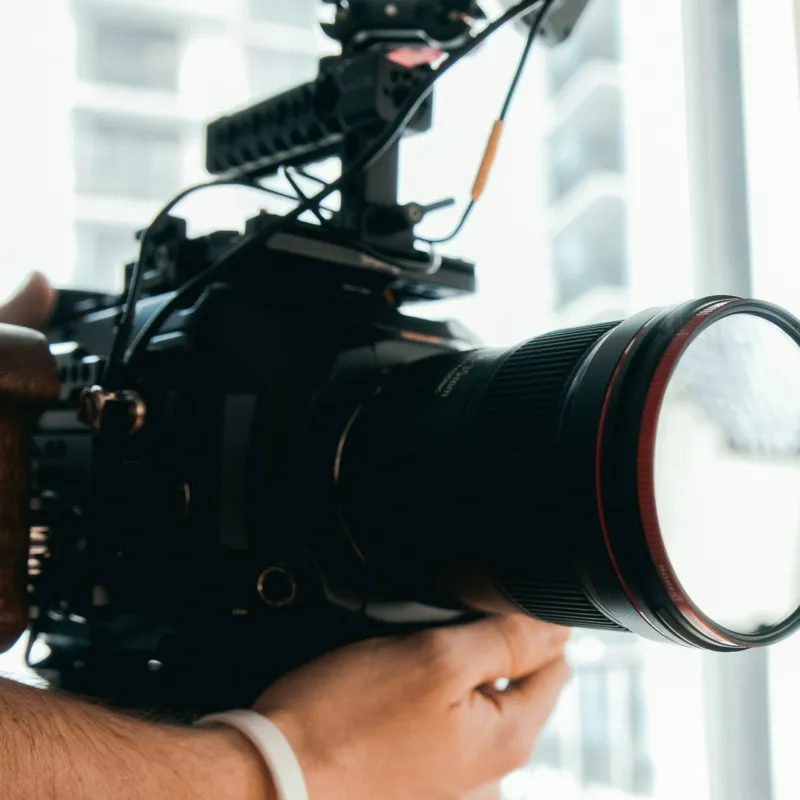 a person holding a camera