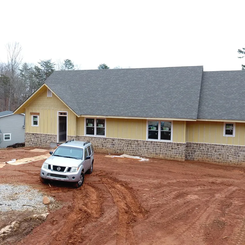a house with a car parked in front of it