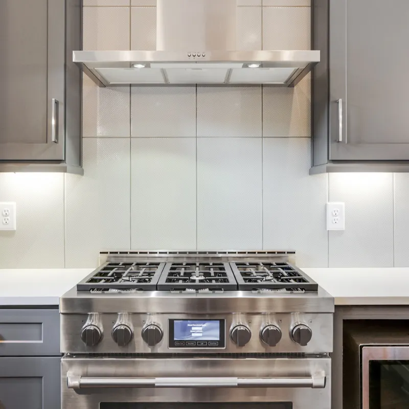 a kitchen with stainless steel appliances