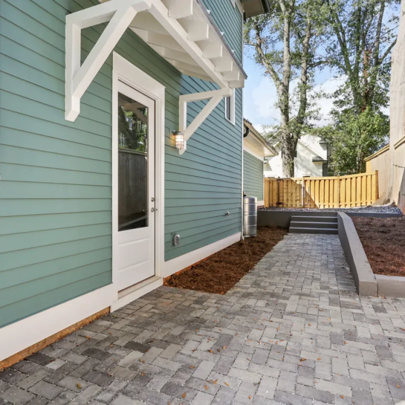 a house with a brick driveway