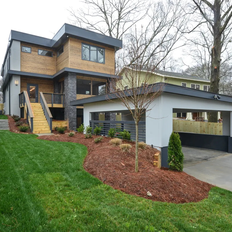 a house with a yard and a fence