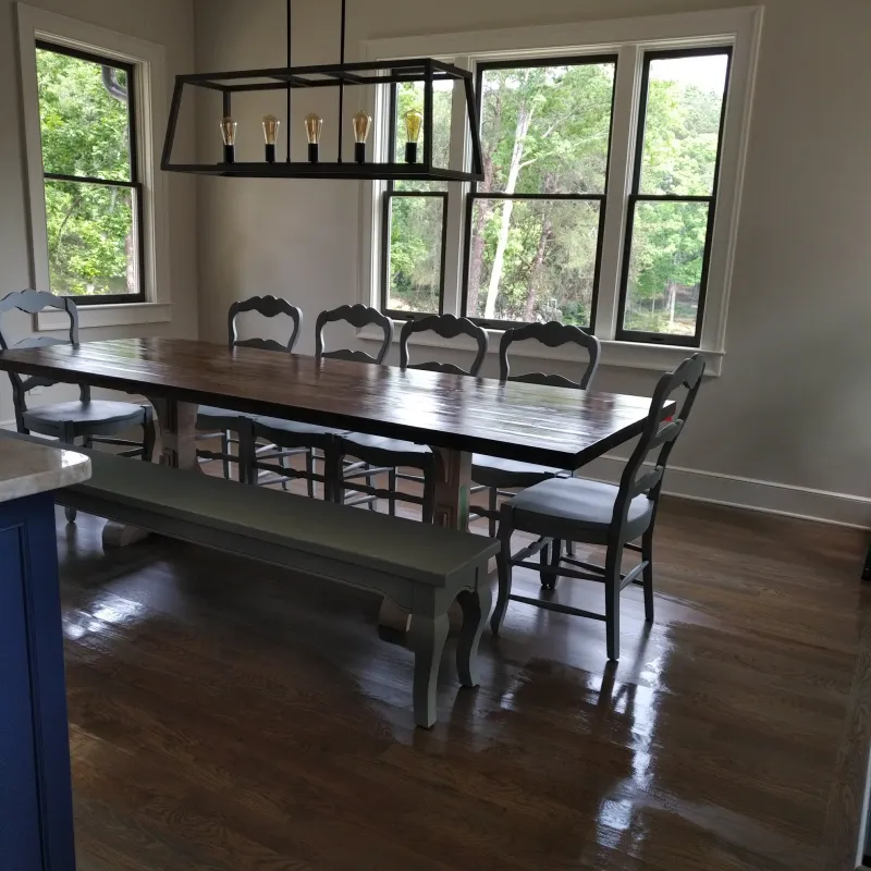 a dining table with chairs around it