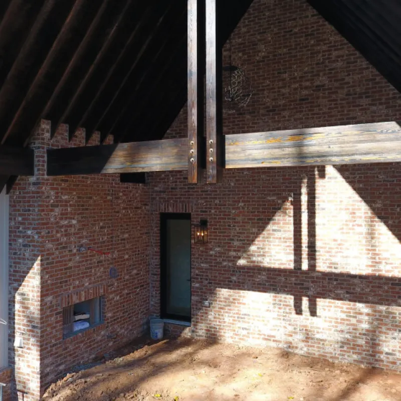 a brick building with a roof