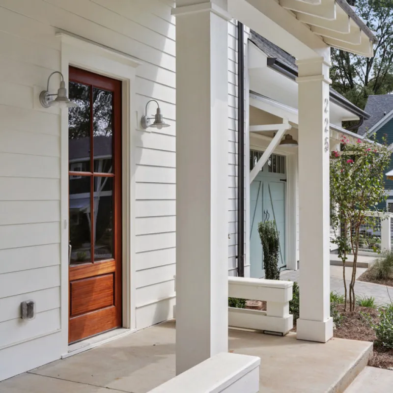 a white house with pillars
