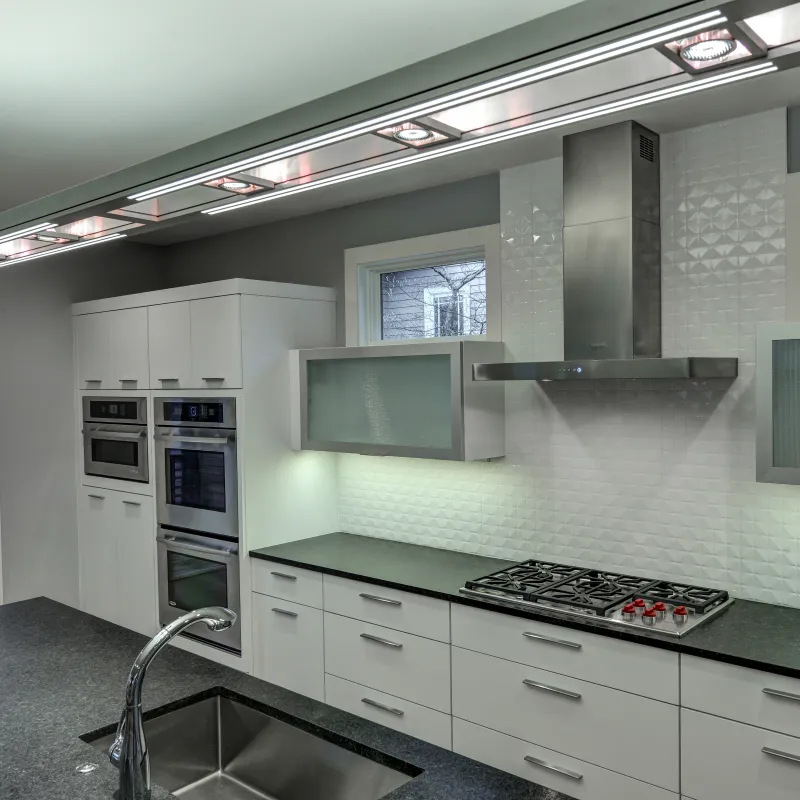 a kitchen with white cabinets