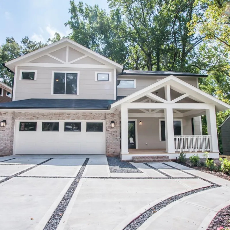 a house with a brick driveway