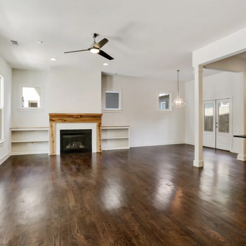 a large kitchen with a fireplace