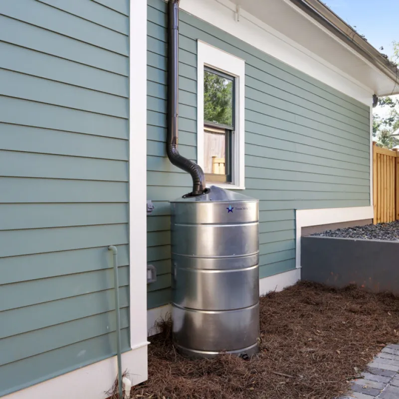a metal can outside a house