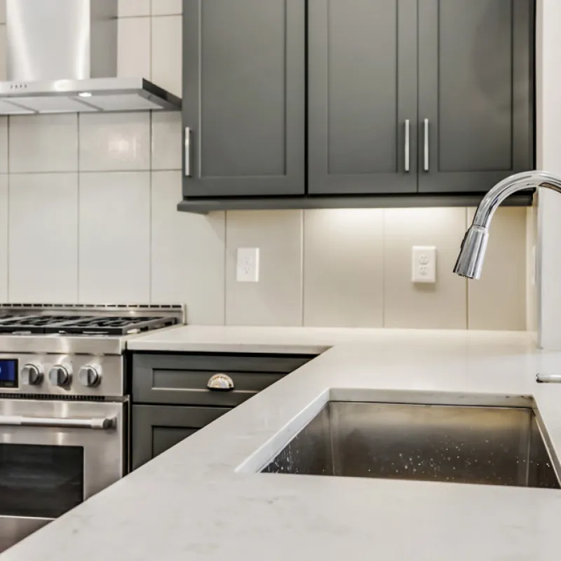 a kitchen with stainless steel appliances