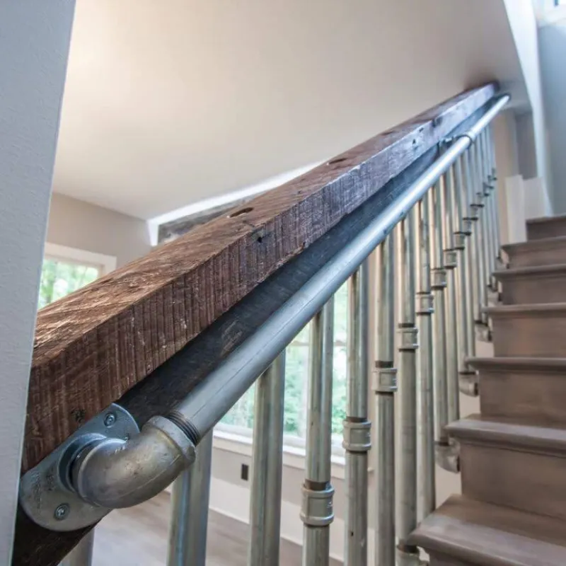 a staircase with metal railings