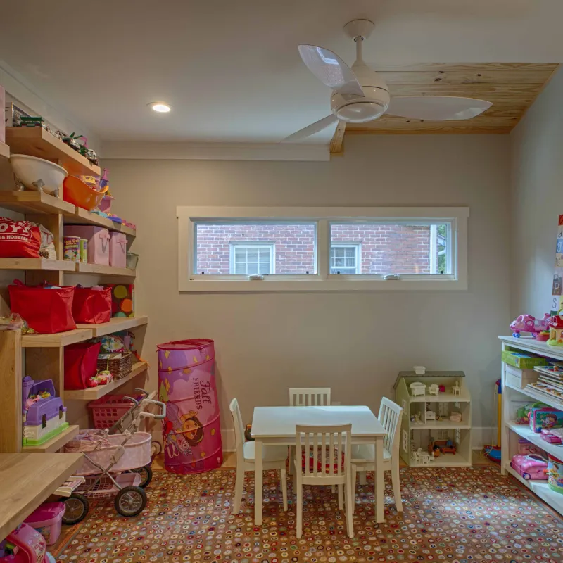 a room with shelves and a table