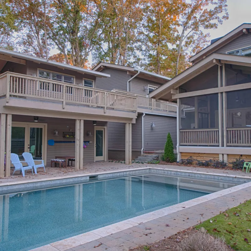 a swimming pool outside a house
