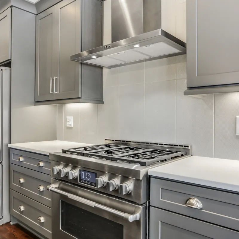 a kitchen with stainless steel appliances