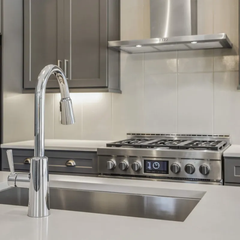 a kitchen with stainless steel appliances