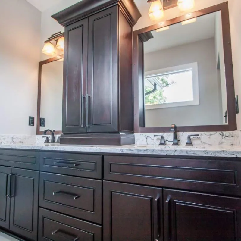 a bathroom with a large mirror