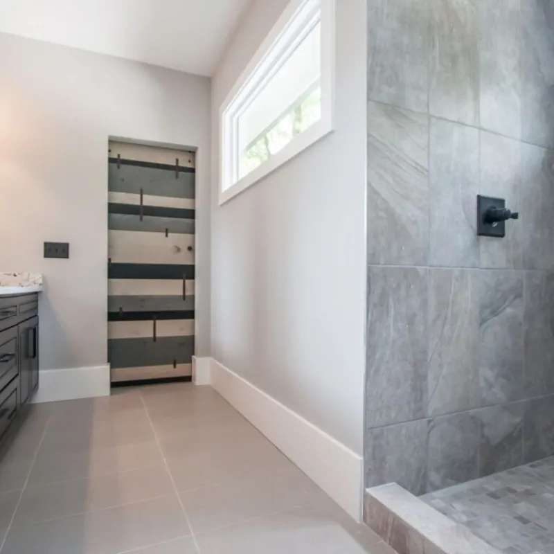 a bathroom with a glass shower