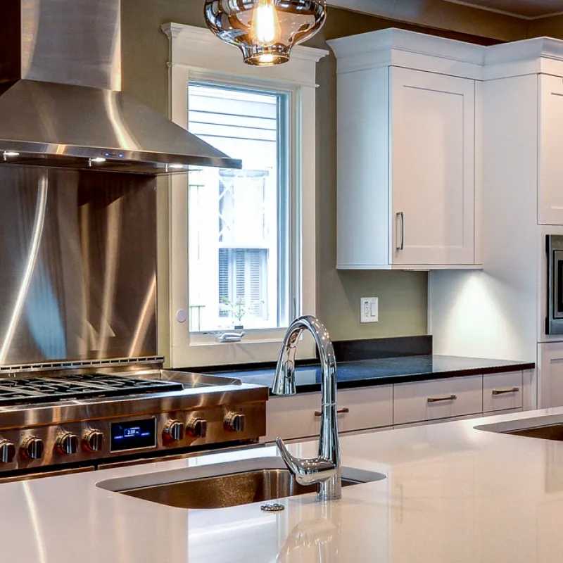 a kitchen with stainless steel appliances