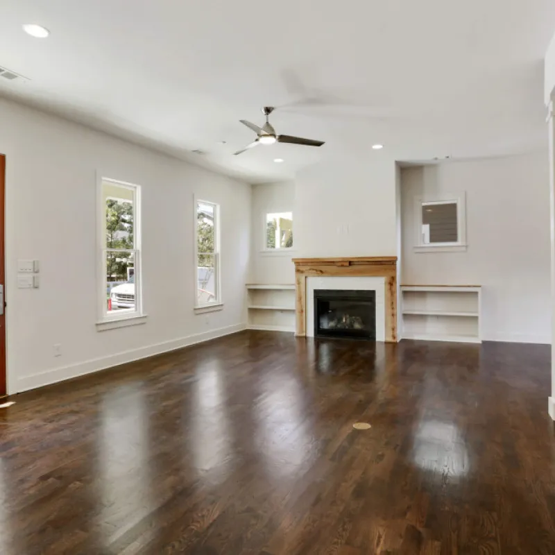a large room with a fireplace