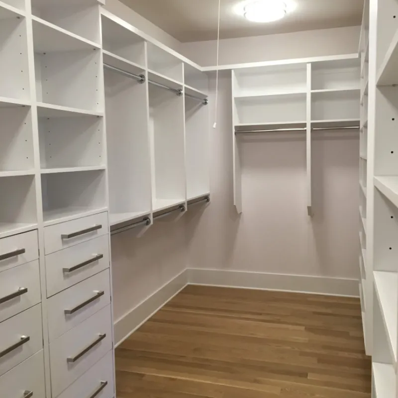 a room with shelves and a mirror