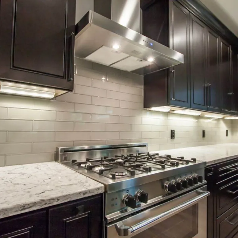 a kitchen with stainless steel appliances