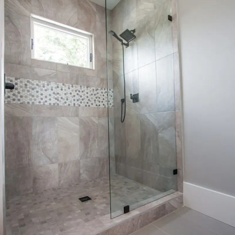 a bathroom with a glass shower