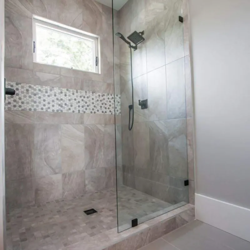 a bathroom with a glass shower