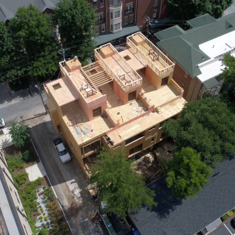 a building with a lot of trees around it