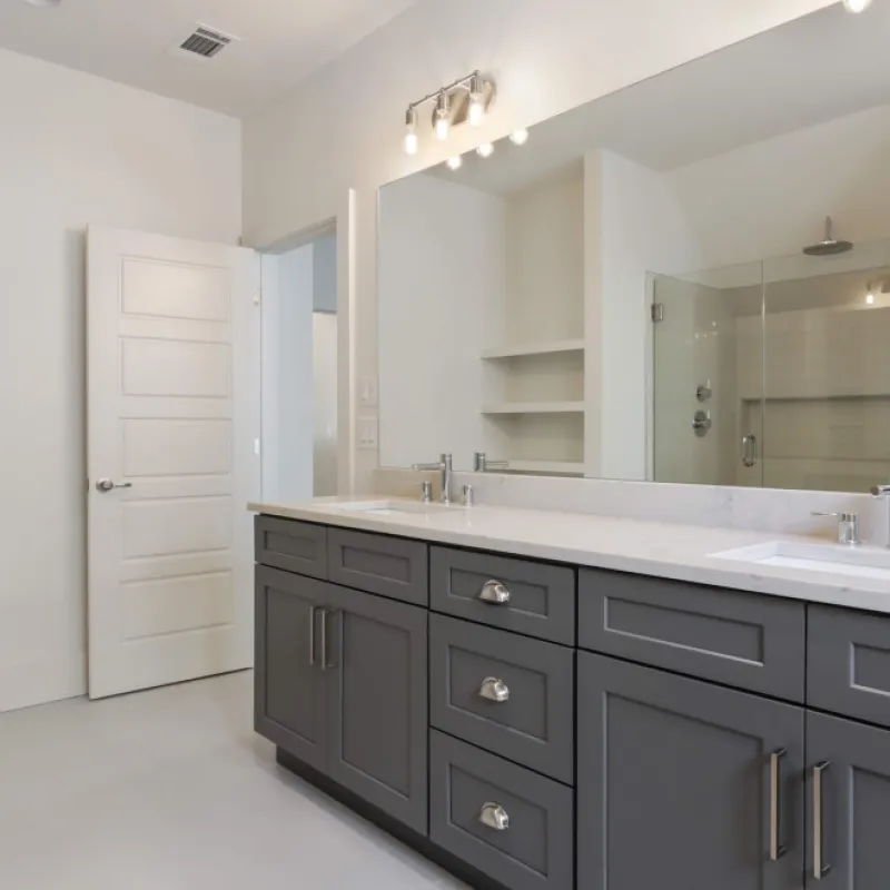 a bathroom with a large mirror