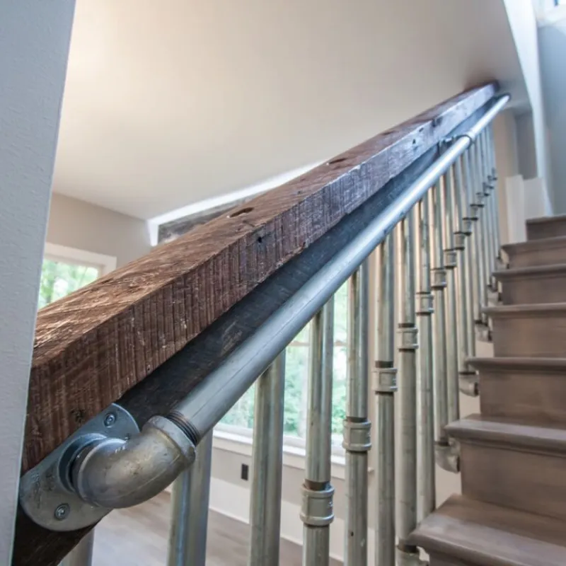 a staircase with metal railings