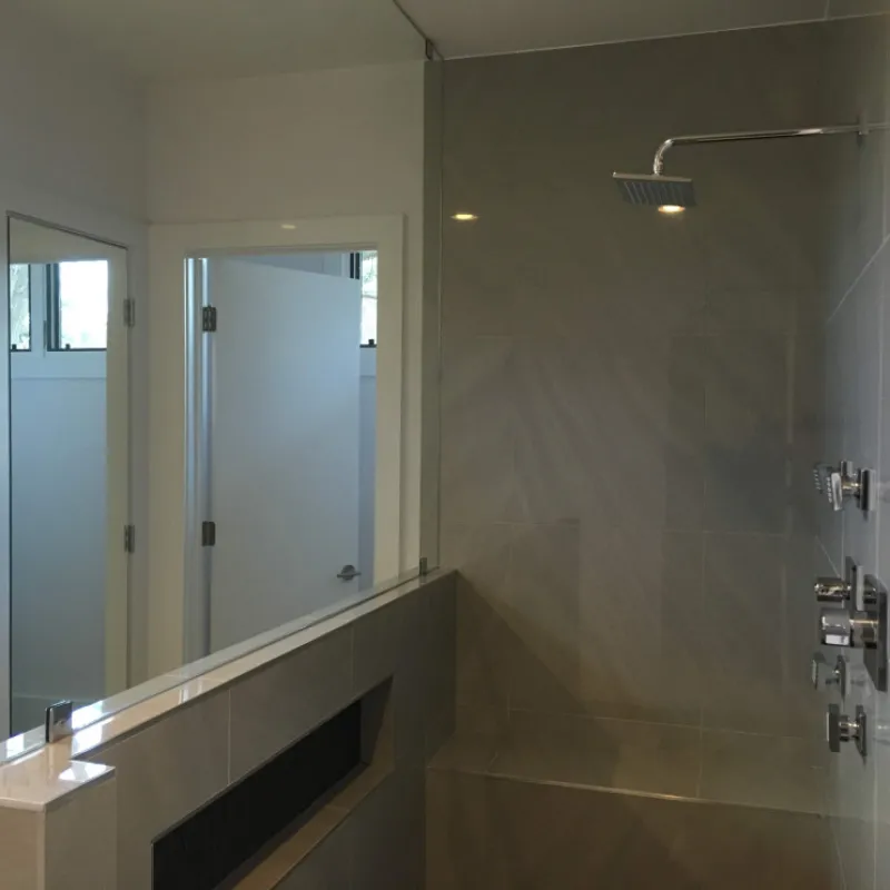 a bathroom with a glass shower
