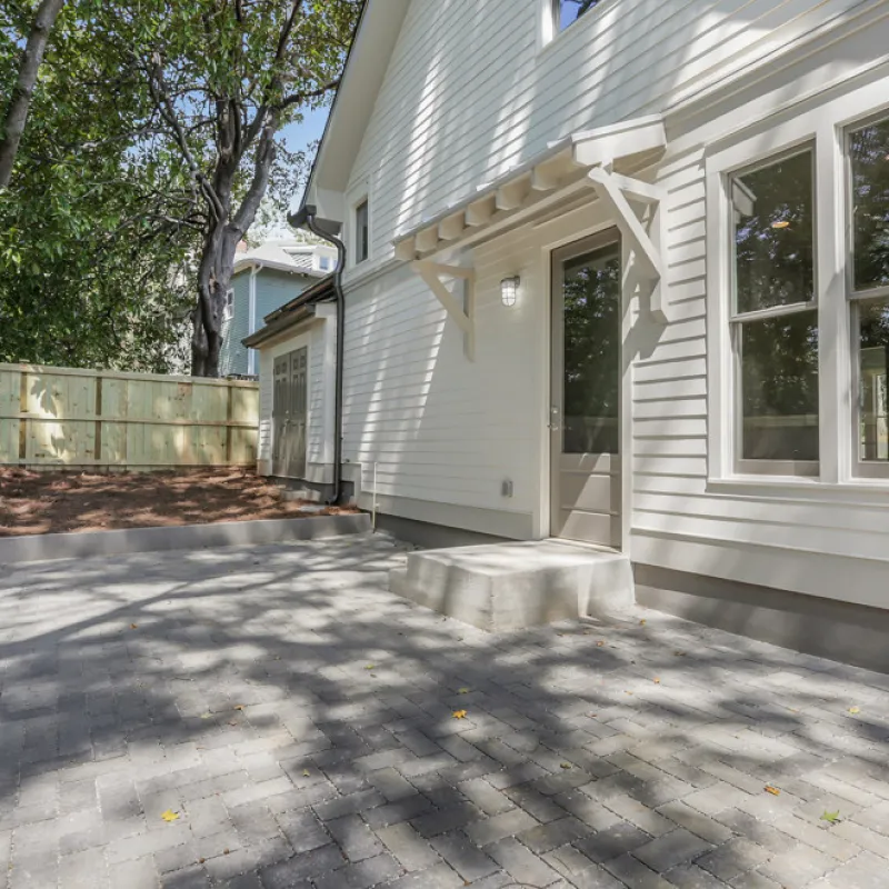 a house with a stone driveway