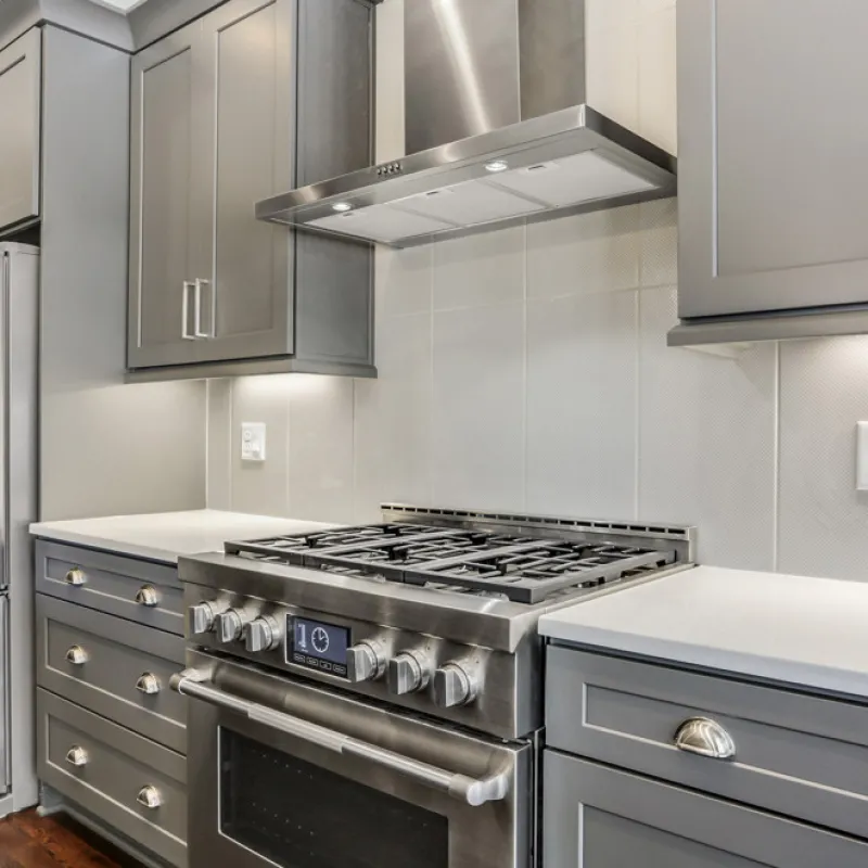 a kitchen with stainless steel appliances