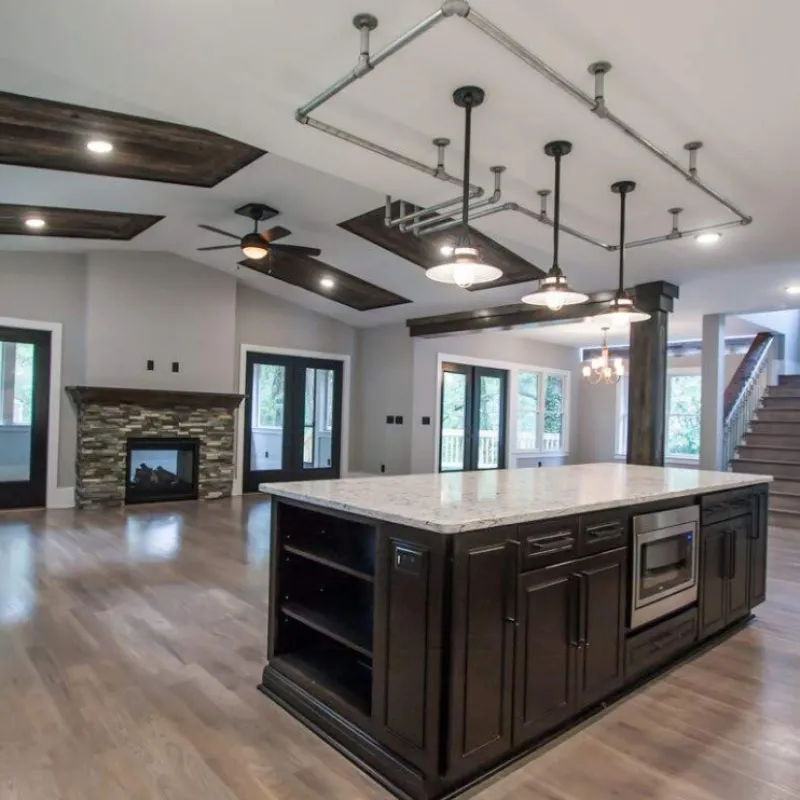 a large kitchen with a fireplace