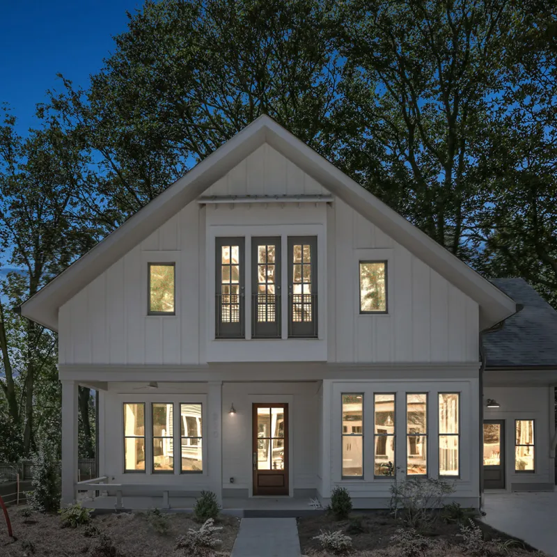 a house with a tree in the front