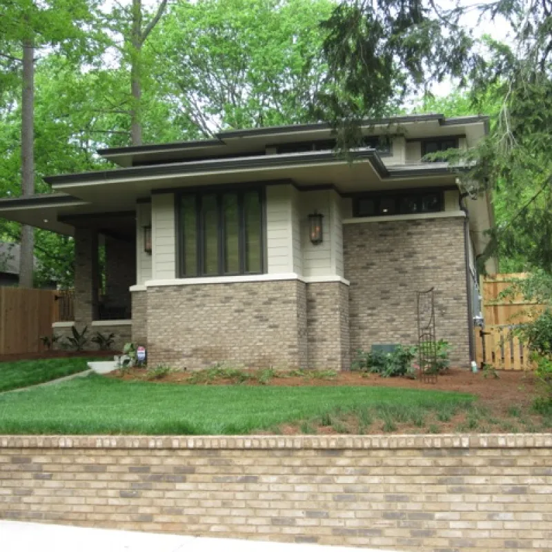a house with a brick driveway