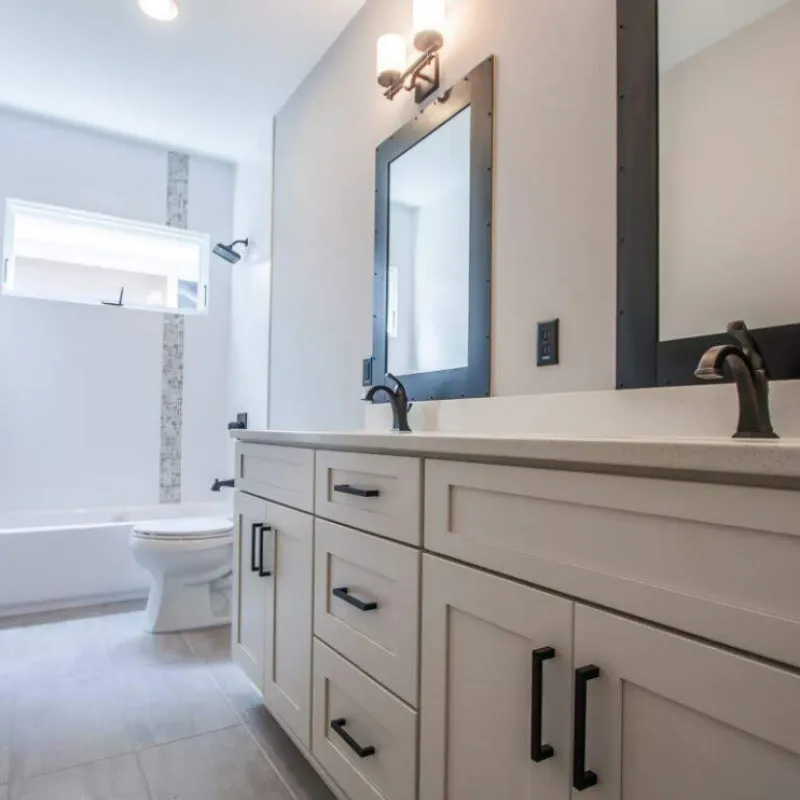 a bathroom with a large mirror