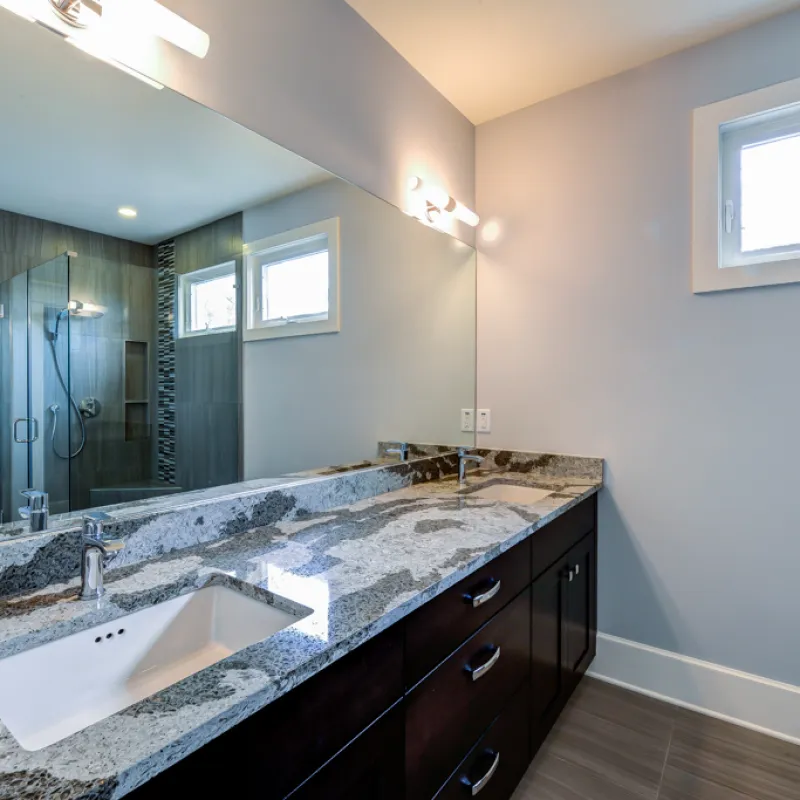 a bathroom with a large mirror
