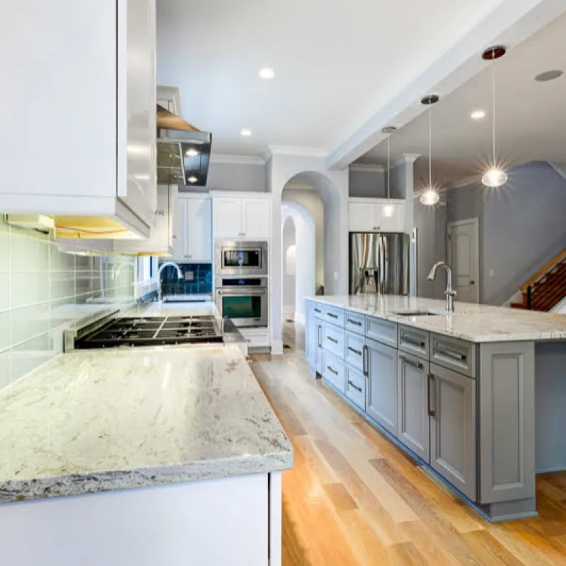 a kitchen with white cabinets